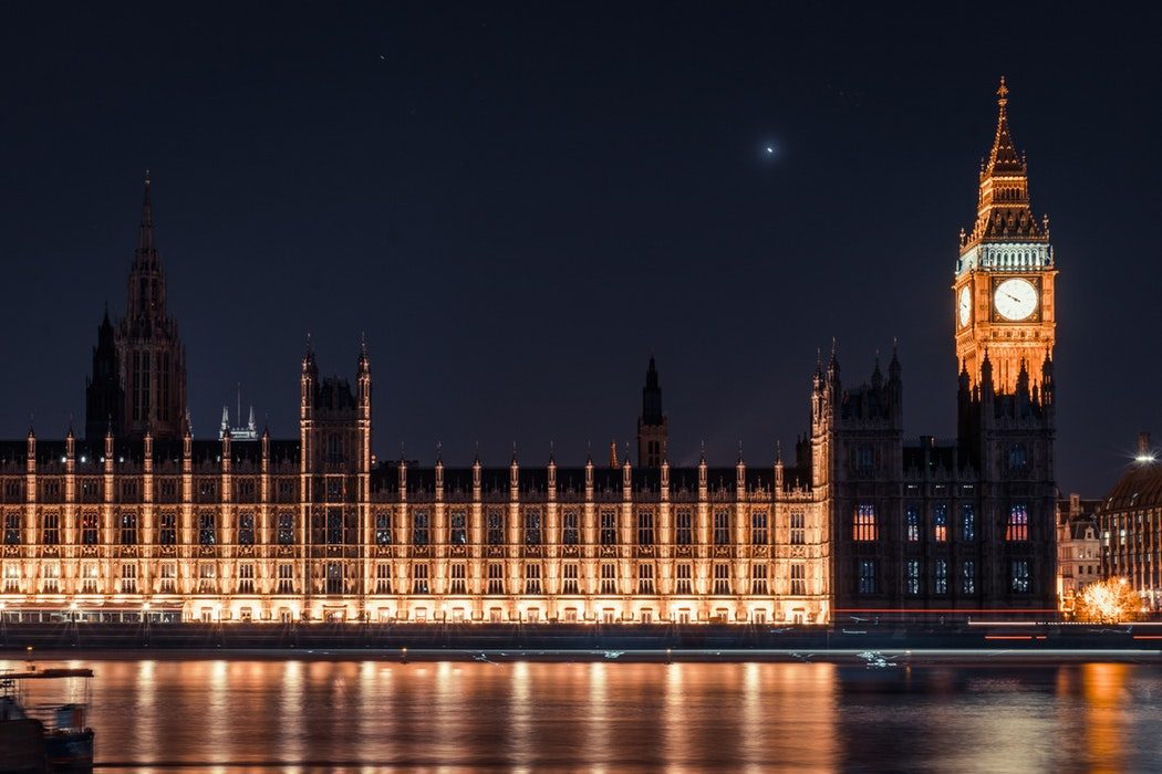 A photo of Big Ben and the houses of parliament in Westminster at night time